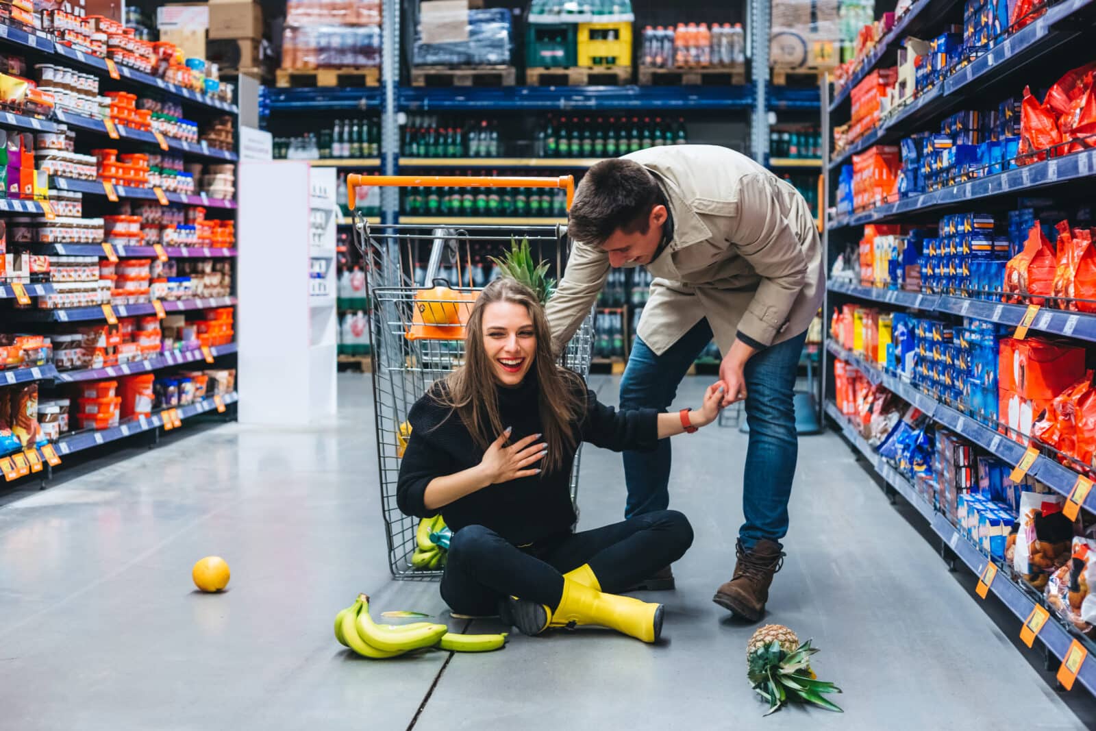 A woman laughing about a slip and fall in a store